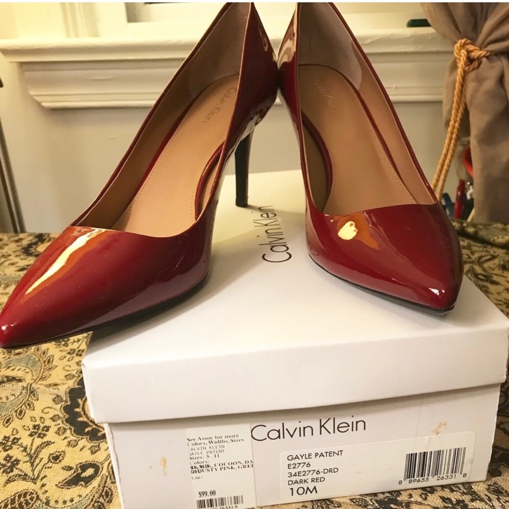 Calvin Klein Red pumps like new.